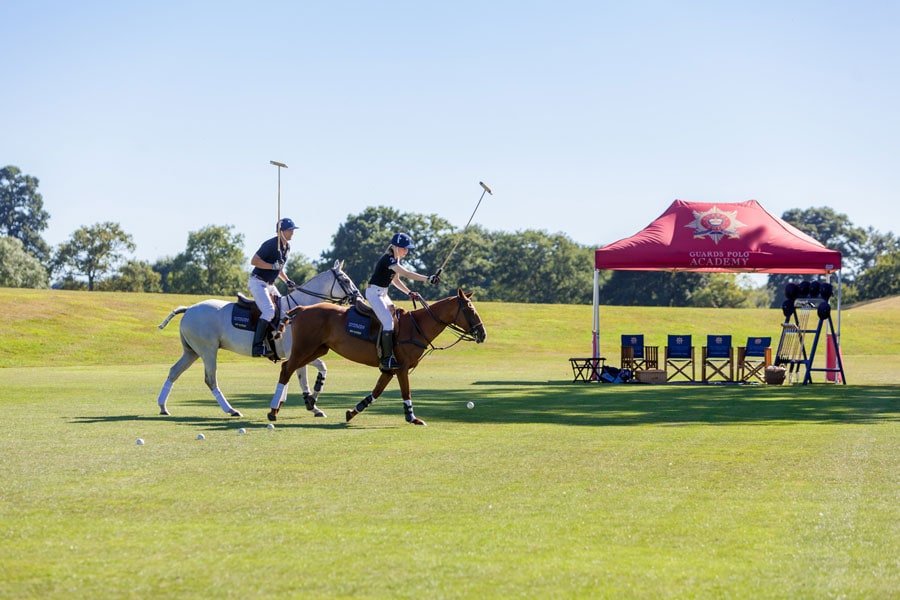 Coworth Park Guard Polo Academy lesson hitting balls in line - ALO Magazine